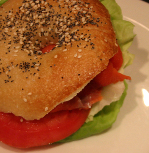 Smoked salmon cream cheese tomato and lettuce on bagel