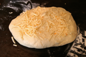 Adding in Fontina cheese