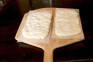 Cook's dough poked with fingertips into rectangle