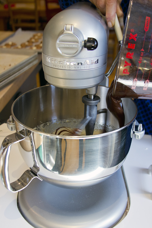 adding melted chocolate