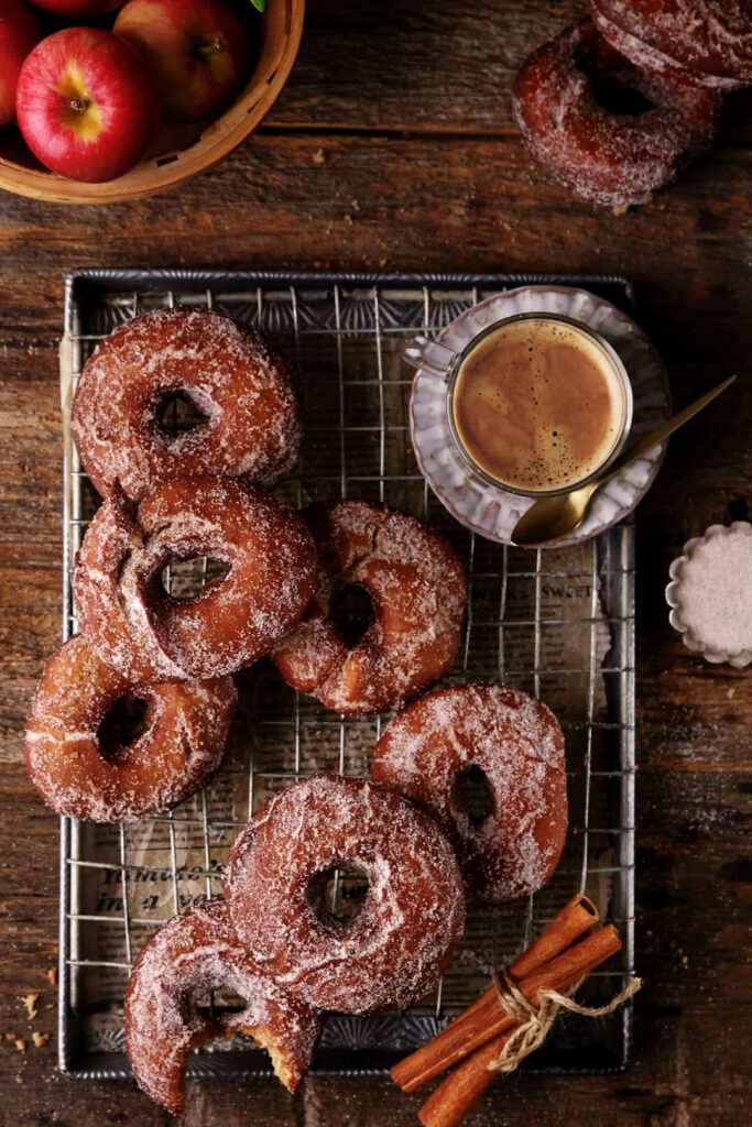 Tray of freshly fried Apple Cider Donuts.
